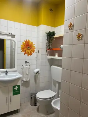 a bathroom with a toilet and a sink at Casa Girassol Old Town in Albufeira