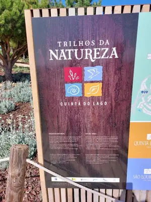 a sign for the tri cities da nirvana at Ancão Beach Apartment in Almancil