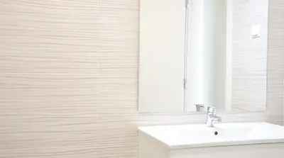 a bathroom with a sink and a mirror at MFA By Albufeira Rental in Albufeira