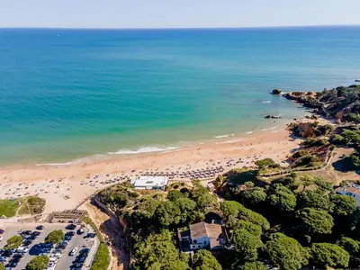 an aerial view of a beach with a group of people at Villa Patio in Albufeira