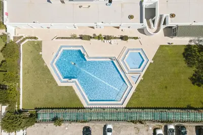 an overhead view of a swimming pool on a lawn at Scandic - City Center by HD Properties in Vilamoura