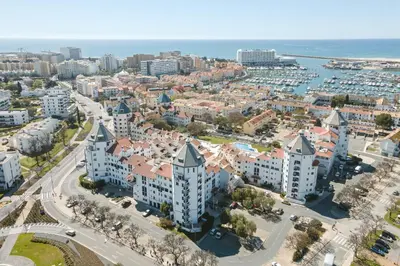an aerial view of a city with buildings at Scandic - City Center by HD Properties in Vilamoura