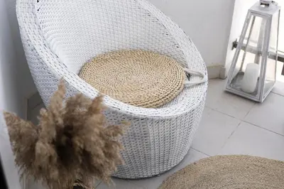 a wicker basket sitting on the floor in a room at Scandic - City Center by HD Properties in Vilamoura