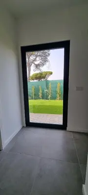 a room with a large window with a view at Valverde 2 Villa, Vilamoura, Algarve, only 5 minutes from Marina, Golf and Beach in Vilamoura
