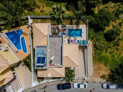 an aerial view of a house with a swimming pool at Villa Casa Vilas Boas in Albufeira