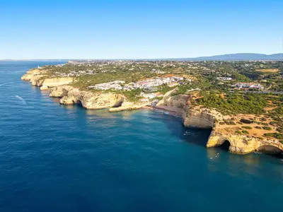 an aerial view of a rocky island in the ocean at Villa Isis by Algarve Vacation in Albufeira