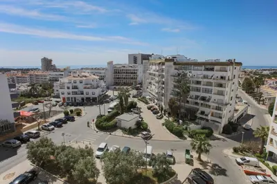 an aerial view of a city with buildings at Go4Portugal - Dinis - Luxe Condo with Pool, Airco, Seaview with two Balcony in Albufeira