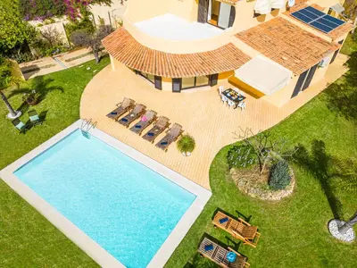 an aerial view of a house with a swimming pool at Villa Samui by Algarve Vacation in Albufeira